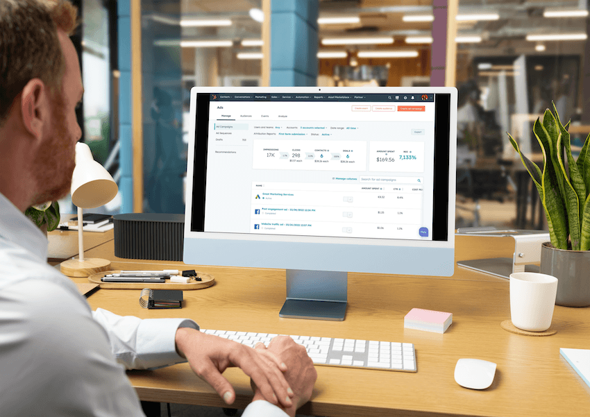 CEO on computer looking at a HubSpot ROI report on his screen